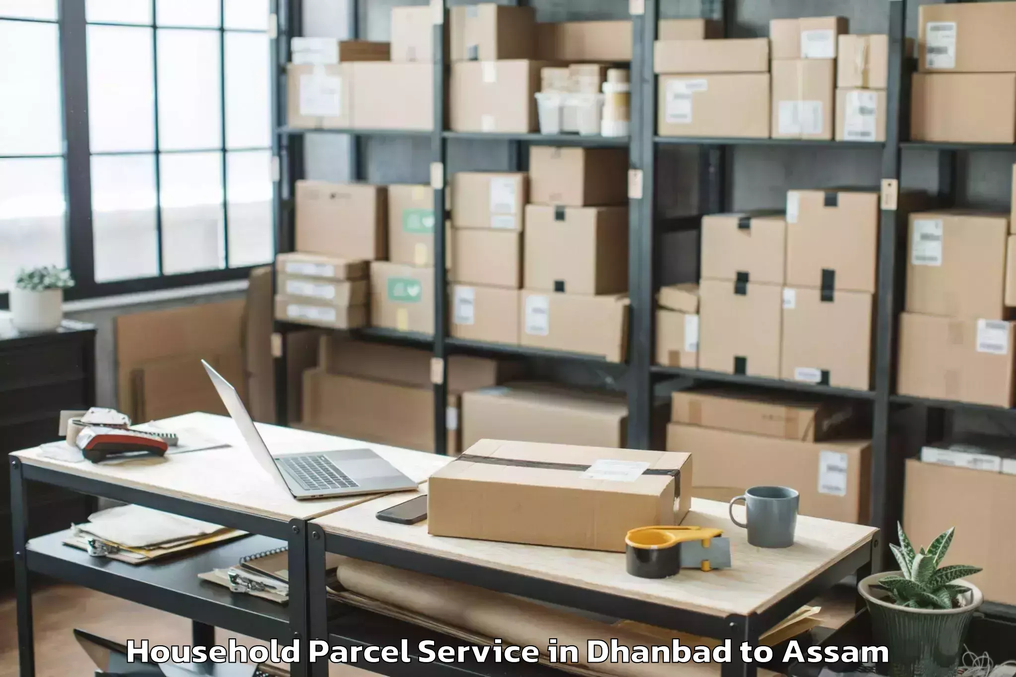 Easy Dhanbad to Darangamela Household Parcel Booking